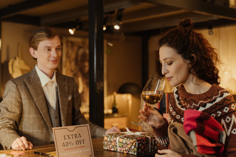 A woman enjoys a glass of wine during a sale experience at a cozy wine shop.