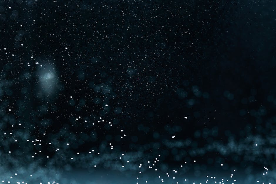 Dynamic abstract background with particles and textures resembling water droplets and a splash effect.